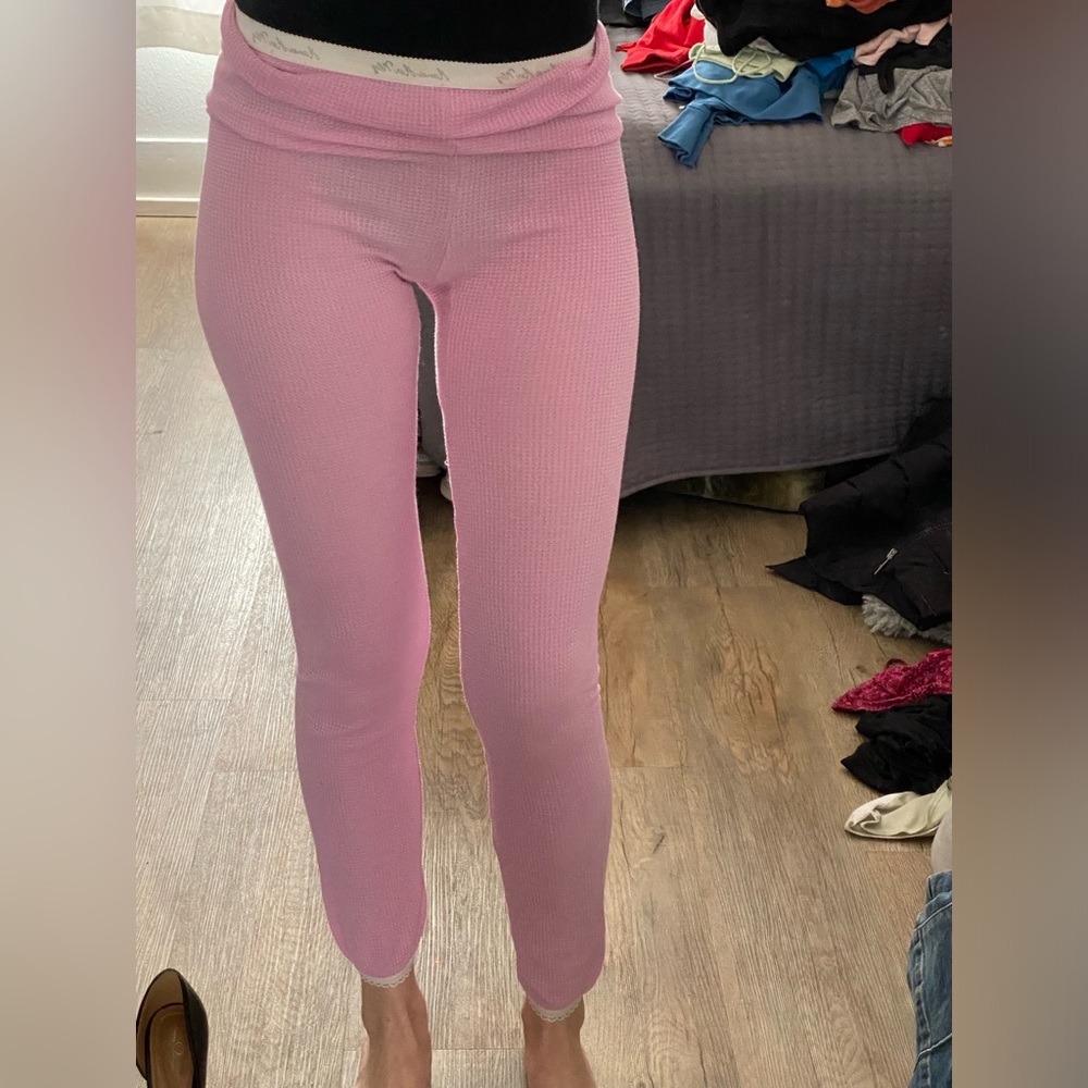 Pink long John’s with ruffle detail on the bottom and cute detail along the toot